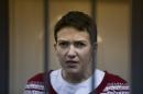 Ukrainian jailed military officer Nadezhda Savchenko listens to the court's decision in a cage at a court room in Moscow, Russia, Wednesday, March 4, 2015. A Russian court has rejected an appeal to release a Ukrainian military officer who has been on hunger strike since mid-December. The case of Nadezhda Savchenko has attracted high attention in recent weeks as concerns rise about her health. who has been on hunger strike since mid-December. The case of Nadezhda Savchenko has attracted high attention in recent weeks as concerns rise about her health. (AP Photo/Pavel Golovkin)