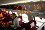 A display shows the speed aboard a train while on journey in Hebei province, south of Beijing, on December 22, 2012. China has started service on the world's longest high-speed rail route, Beijing to Guangzhou, the latest milestone in the country's rapid and -- sometimes troubled -- super fast rail network