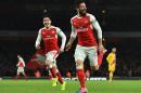 Arsenal's striker Olivier Giroud celebrates scoring his team's first goal during the English Premier League football match against Crystal Palace January 1, 2017