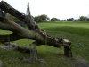 A toppled oak tree lays next to the second green after a severe thunderstorm passed through, causing a suspension of play, during the final round of the Arnold Palmer Invitational golf tournament in Orlando, Fla., Sunday, March 24, 2013.(AP Photo/Phelan M. Ebenhack)