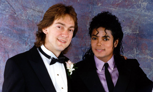 FILE - In this 1987 file photo originally released by John Branca, attorney John Branca, left, and Michael Jackson are shown at Branca's wedding in Beverly Hills, Calif. Branca, and his co-executor, John McClain, have been successfully pursuing projects to pay off a mountain of debt left by the superstar, to assure the financial future of his three children and to guarantee that Jackson's music will live forever. (AP Photo/ Courtesy of John Branca, File) ** NO SALES **