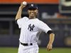 Injured New York Yankees closer Rivera throws out the ceremonial first pitch before Game 3 of their MLB ALDS baseball playoff series against the Baltimore Orioles in New York