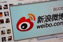 File photo showing the logo of Sina Corp's Chinese microblog website "weibo" in Beijing