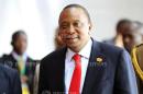 Kenya's President Kenyatta arrives for a meeting in Addis Ababa
