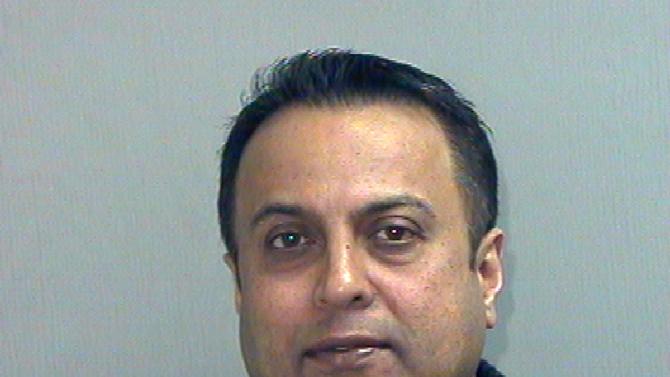 This photo provided by the Enfield, Connecticut Police Department shows dentist Rashmi Patel, who has been charged in the death of a patient who became unresponsive while having 20 teeth pulled and several implants installed last year.  Patel faces a misdemeanor count of criminally negligent homicide and a felony count of tampering with evidence, according to police. (AP Photo/Enfield, Connecticut. Police Department)