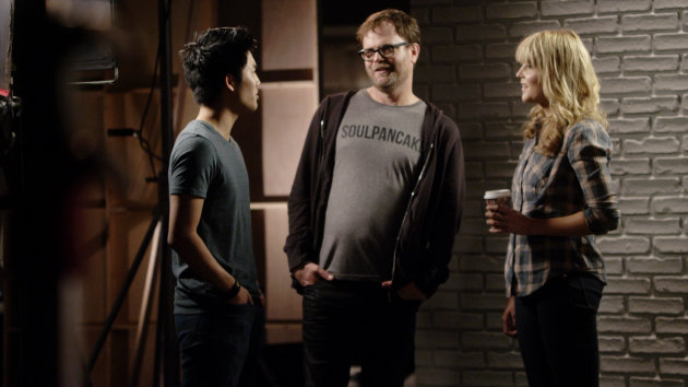 This undated publicity photo provided by Google Inc. shows, from left, Ryan Higa, Rainn Wilson and Grace Helbig shooting a video for YouTube’s planned Comedy Week. From May 19-25, 2013, YouTube will host a themed week of comedy programming, featuring live-streams, videos and stand-up routines from comedy stars like Sarah Silverman and Jimmy Kimmel, as well as the less famous comedians of YouTube. (AP Photo/Google Inc., John Lindley)