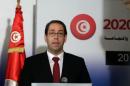 Tunisia's Prime Minister Youssef Chahed speaks during a news conference with his French counterpart Manuel Valls in Tunis