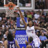 Los Angeles Clippers center DeAndre Jordan (6) throws down a dunk in front of Phoenix Suns forward Luis Scola (14), of Argentina, and forward Wesley Johnson (2) in the first half of an NBA basketball game in Los Angeles on Wednesday, April  3, 2013. (AP Photo/Richard Hartog)