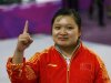 China's Guo Wenjun celebrates after winning the women's 10m Air Pistol qualification competition at the London 2012 Olympic Games