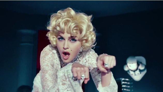 نجمات في ثوب "أسطورة الإغراء" مارلين مونرو Madonna-give-me-all-your-luvin-video-cap-0148-jpeg_103126
