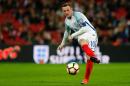England's captain Wayne Rooney passes the ball during the World Cup 2018 football qualification match between England and Malta at Wembley Stadium in London on October 8, 2016