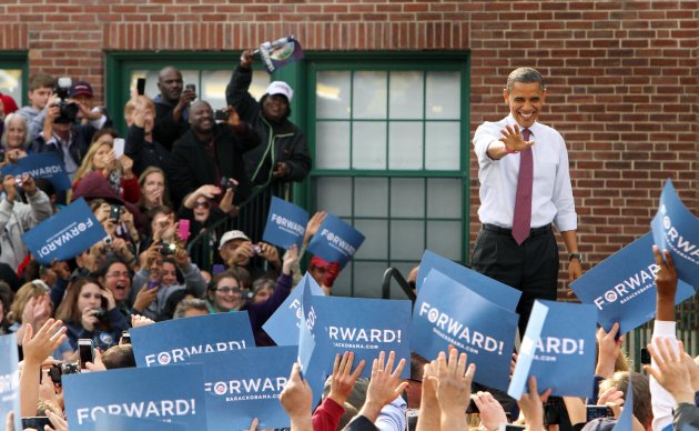 President Barack Obama arrives for a campaign event at Elm Street Middle School, Saturday, Oct. 27, 2012 in Nashua, N.H. (AP Photo/Jim Cole)