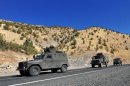 A Turkish military convoy patrols a highway near the border with Iraq in October 2011