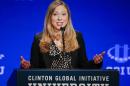 FILE - In this March 2, 2014 file photo, Chelsea Clinton, vice chair of the Clinton Foundation, speaks during a student conference for the Clinton Global Initiative University at Arizona State University in Tempe, Ariz. Former President Bill Clinton and former Secretary of State Hillary Rodham Clinton are in Oxford, England, this weekend to attend the graduation ceremonies of their daughter Chelsea. Chelsea Clinton will receive her doctorate degree in international relations on May 10 from the prestigious British university. (AP Photo/Matt York, File)