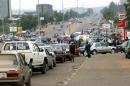 Motorists rush to buy petrol in Abuja in 2003