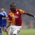 Galatasaray's Drogba is challenged by Schalke 04's Hoger during their Champions League soccer match in Istanbul