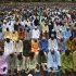 Muslims pray in an open ground during Eid al-Fitr celebrations, marking the end of the holy month of Ramadan in Lagos
