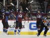 Colorado Avalanche center Matt Duchene, center, celebrates after scoring a goal with defenseman Shane O'Brien, left, and right wing PA Parenteau against the Chicago Blackhawks in the second period of an NHL hockey game in Denver, Friday, March 8, 2013. (AP Photo/David Zalubowski)
