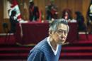 Peru's former president, Alberto Fujimori, appears in court for a hearing in Lima, on November 7, 2013