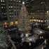 The Rockefeller Center Christmas Tree is lit during the 80th annual tree lighting ceremony at Rockefeller Center in New York, Wednesday, Nov. 28, 2012. (AP Photo/Kathy Willens)