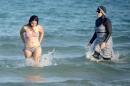 Some lawmakers in Canada's Quebec province have called for outlawing "burkinis" -- body-concealing Islamic swimsuits -- following bans in at least 15 towns in France's southeast