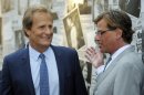 Aaron Sorkin, right, creator/executive producer of "The Newsroom," greets cast member Jeff Daniels at the season 2 premiere of the HBO series at the Paramount Theater on Wednesday, July 10, 2013 in Los Angeles. (Photo by Chris Pizzello/Invision/AP)