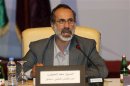 Activist preacher Moaz al-Khatib speaks the General Assembly of the Syrian National Council in Doha