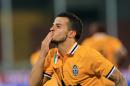 Juventus's Sebastian Giovinco celebrates after scoring during the Serie A soccer match between Udinese and Juventus at the Friuli Stadium in Udine, Italy, Monday, April 14 2014. (AP Photo/Paolo Giovannini)