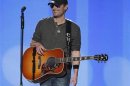 Singer Eric Church smiles after performing "Springsteen" at the 47th annual Academy of Country Music Awards in Las Vegas
