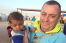 This undated family handout photo shows British man Alan Henning, who was held hostage by the Islamic State group. An Internet video released Friday purports to show an Islamic State group fighter beheading British hostage Alan Henning and threatening yet another American captive, the fourth such killing carried out by the extremist group now targeted in U.S.-led airstrikes. The video mirrored other beheading videos shot by the Islamic State group, which now holds territory along the border of Syria and Iraq. It ended with an Islamic State fighter threatening a man they identified as an American. (AP Photo/PA Wire) UNITED KINGDOM OUT NO SALES NO ARCHIVES