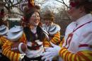 Clowns talk before the start of the 87th Macy's Thanksgiving day parade in New York