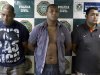 Suspects Wallace Aparecido Souza Silva, left, Carlos Armando Costa dos Santos, center, and Jonathan Foudakis de Souza are presented to the press at the Special Police Unit for Tourism Support (DEAT) after being arrested for allegedly attacking tourists in Rio de Janeiro, Brazil, Tuesday, April 2, 2013. An American woman was gang raped and beaten aboard a public transport van while her French boyfriend was shackled, hit with a crowbar and forced to watch the attacks after the pair boarded the vehicle in Rio de Janeiro's showcase Copacabana beach neighborhood, police said.  The attacks took place over six hours starting shortly after midnight on Saturday. (AP Photo/Felipe Dana)