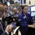 In this Oct. 27, 2011 photo, specialist Jennifer Klesaris, right, works at her post on the floor of the New York Stock Exchange Thursday, Oct. 27, 2011.  The euphoric rally in share prices fed by a European deal to cut Greece's debt and prevent larger countries from falling down the same hole slowed on Friday, Oct. 28, as investors began to recognize the significant challenges that still face the continent. (AP Photo/Richard Drew)