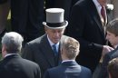 Prince Philip, center, the husband of Britain's Queen Elizabeth II attends a garden party at Buckingham Palace in London, Thursday, June 6, 2013. Buckingham Palace says Queen Elizabeth II's husband was later admitted to a London hospital for an exploratory operation. The palace said the operation on 91-year-old Prince Philip will come after "abdominal investigations," but did not elaborate. (AP Photo/Matt Dunham, Pool)