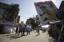 A poster with a caricature depicting Egypt's army chief General Abdel Fattah al-Sisi that reads "Butcher worship", is seen at Rabaa Adawiya Square, east of Cairo