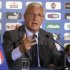 FILE - In this May 8, 2010 file photo, Italian national soccer team coach Marcello Lippi talks to the media during a press conference in Rome. Lippi has been hired to coach big-spending Chinese Super League club Guangzhou Evergrande. Evergrande released a statement Thursday, May 17, 2012, saying it had hired the World Cup-winning Italian coach until November 2014. (AP Photo/Andrew Medichini, File)