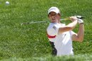 Rory McIlroy of Northern Ireland hits from the sand on the eighth hole during the Nationwide Invitational Pro-Am at the Memorial Tournament in Dublin