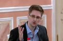 An image grab taken from a video released by Wikileaks on October 12, 2013 shows US intelligence leaker Edward Snowden speaking during a dinner with US ex-intelligence workers and activists in Moscow on October 9, 2013