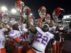 Florida players celebrate after defeating Florida State 37-26 in an NCAA college football game, Saturday, Nov. 24, 2012, in Tallahassee, Fla. (AP Photo/John Raoux)