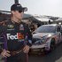 FILE - In this March 22, 2013, file photo, Denny Hamlin stands in the garage area after taking the pole position in his FedEx Express Toyota for the NASCAR Sprint Cup series Auto Club 400 auto race in Fontana, Calif. NASCAR is not penalizing Tony Stewart for scuffling with Joey Logano on pit road at California, and viewed the crash between Logano and Denny Hamlin as a racing incident. AP Photo/Reed Saxon, File)