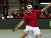 Canada's Frank Dancevic hits a return to Spain's Marcel Granollers during the first round of the Davis Cup tennis tie in Vancouver