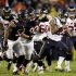 Houston Texans running back Arian Foster (23) rushes past Chicago Bears linebacker Nick Roach (53) and defensive tackle Stephen Paea (92) during the first half an NFL football game, Sunday, Nov. 11, 2012, in Chicago. (AP Photo/Nam Y. Huh)