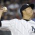 New York Yankees' Kuroda pitches to the Boston Red Sox in their MLB game in New York