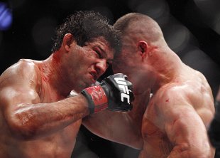 Gilbert Melendez and Diego Sanchez were in an all-out war on Saturday. (USA Today)