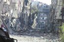 View of buildings damaged by missiles fired in Daraya