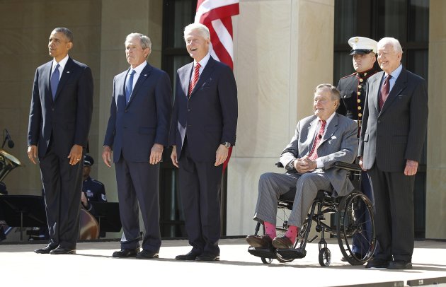 (From L - R) U.S. President Barack Obama stands alongside former presidents George W. Bush, Bill Clinton, George H.W. Bush and Jimmy Carter as they attend the dedication ceremony for the George W. Bush Presidential Center in Dallas, April 25, 2013. Obama is in Texas to stand shoulder-to-shoulder with former President George W. Bush in what could serve as a powerful reminder of the ongoing struggle against terrorism, from the Sept. 11 attacks to the Boston Marathon bombings. REUTERS/Jason Reed (UNITED STATES - Tags: POLITICS)