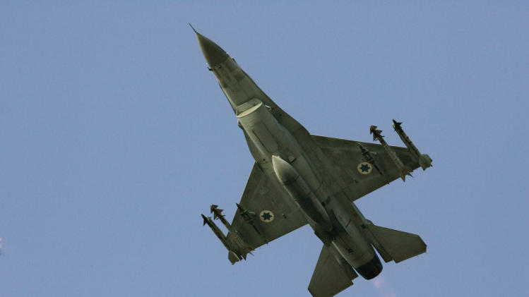 FILE - In this Sunday, July 16, 2006 file photo an Israeli F-16 warplane takes off to a mission in Lebanon from an air force base in northern Israel. A rising chorus of Israeli voices is again raising the possibility of carrying out a military strike on Iran’s nuclear facilities in what appears to be an attempt to draw renewed attention to Tehran’s atomic program - and Israel’s unhappiness with international negotiations with the Iranians. (AP Photo/Ariel Schalit, File)