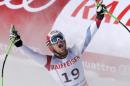 Switzerland's Patrick Kueng reacts after completing his run during the men's downhill competition at the alpine skiing world championships on Saturday, Feb. 7, 2015, in Beaver Creek, Colo. (AP Photo/Marco Trovati)