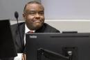 Former DRCongo leader Jean-Pierre Bemba Gombo waits in a court room of the ICC to hear the delivery of the verdict against him blamed for unbridled rapes and killings by his private army in Central African Republic on March 21, 2016