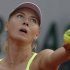 Russia's Maria Sharapova serves against Su-Wei Hsieh of Taipei in their first round match of the French Open tennis tournament, at Roland Garros stadium in Paris, Monday, May 27, 2013. (AP Photo/Michel Spingler)